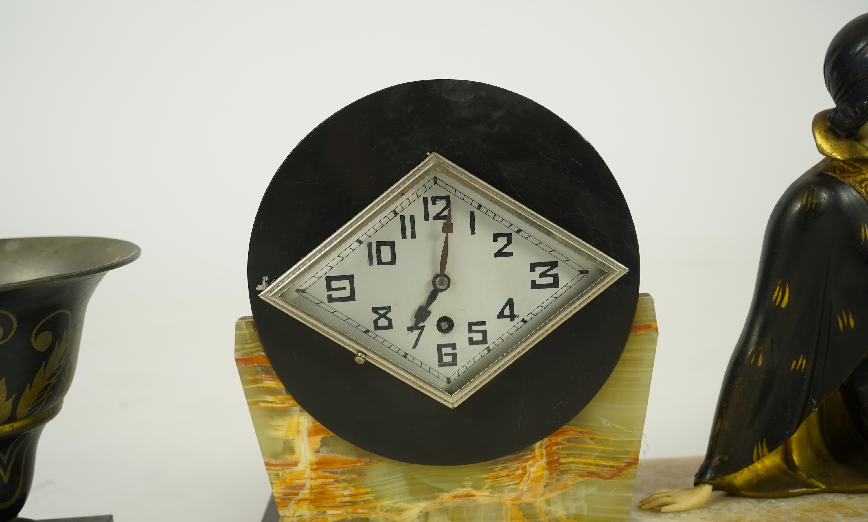 Attributed to Uriano (Ugo Cipriani, Italian, 1897-1960), a French Art Deco marble clock garniture